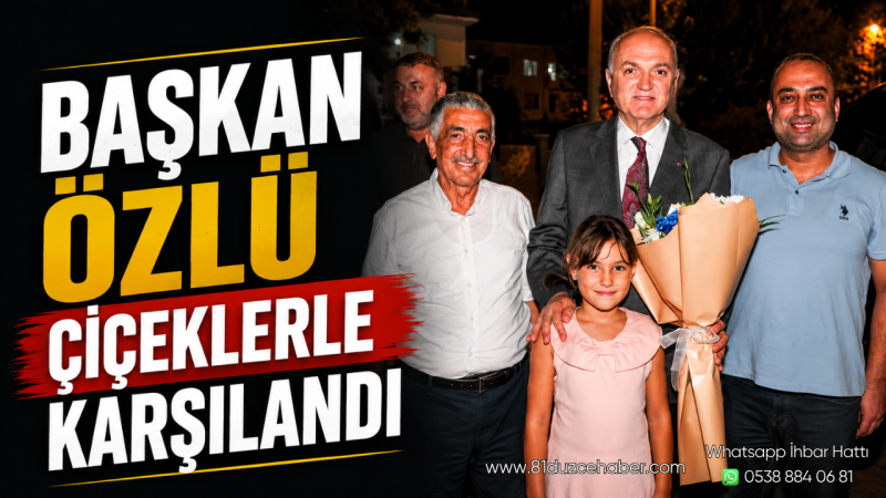 Başkan Özlü Çiçeklerle Karşılandı